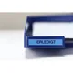 Brother TZe-521 Schriftband 9mm x 8m, schwarz auf blau, selbstklebend